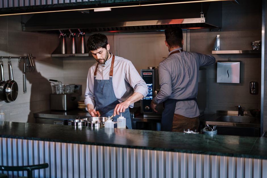 Wood-fired pizza restaurant dining atmosphere with warm ambiance and comfortable seating